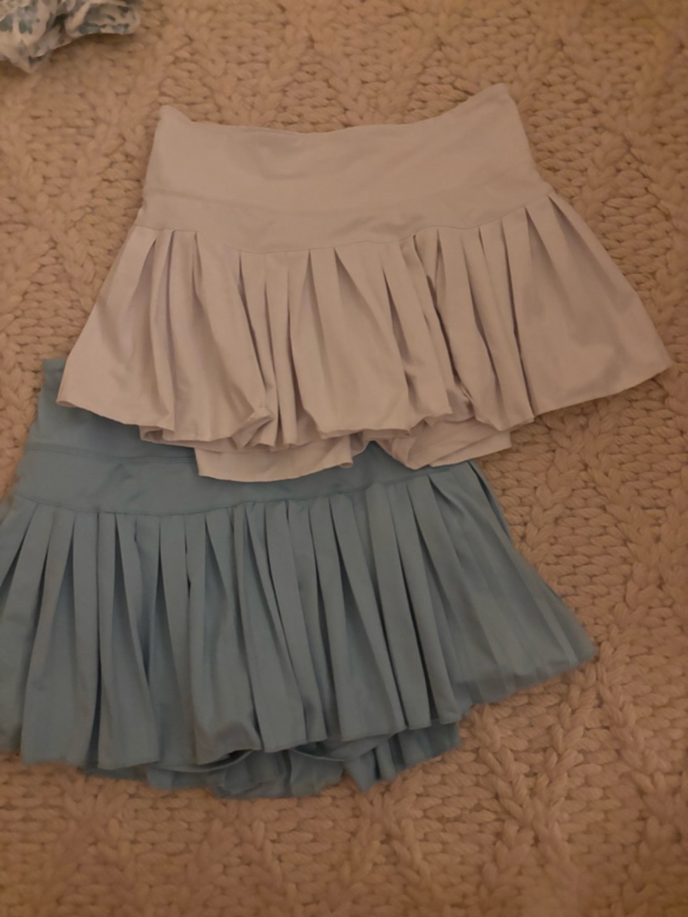 Pleated Mini Skirts in Light Blue and Pale Gray